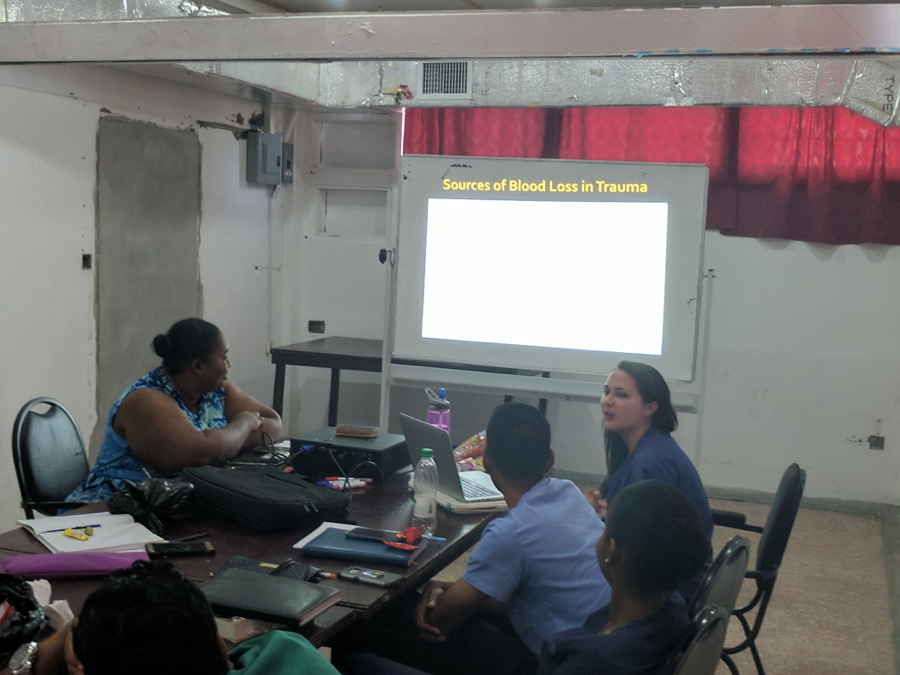 Jamie Cirbus MD, giving a lecture on trauma care at weekly Emergency Medicine Conference at Georgetown Public Hospital, August 2017.